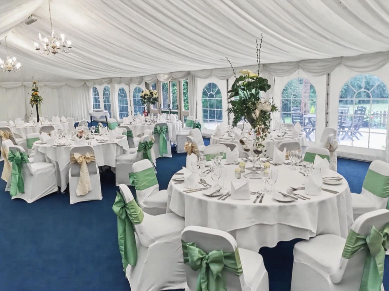 Elegant event tent setup at Marston Farm Hotel.