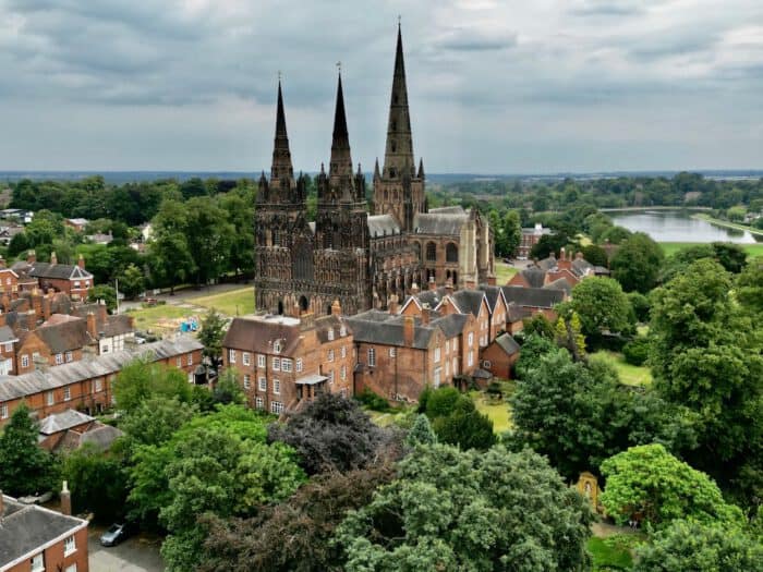 Historic cathedral in a scenic town setting.
